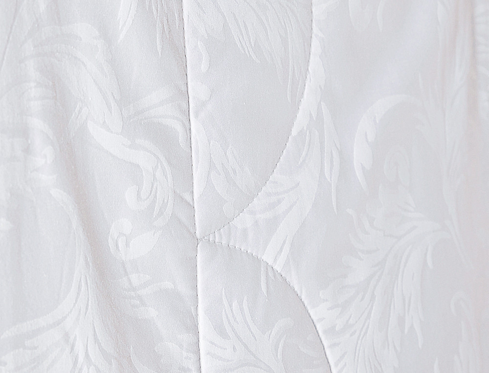 /fr/la-chambre/couettes/couettes-naturelles/couette-satin-hiver/
