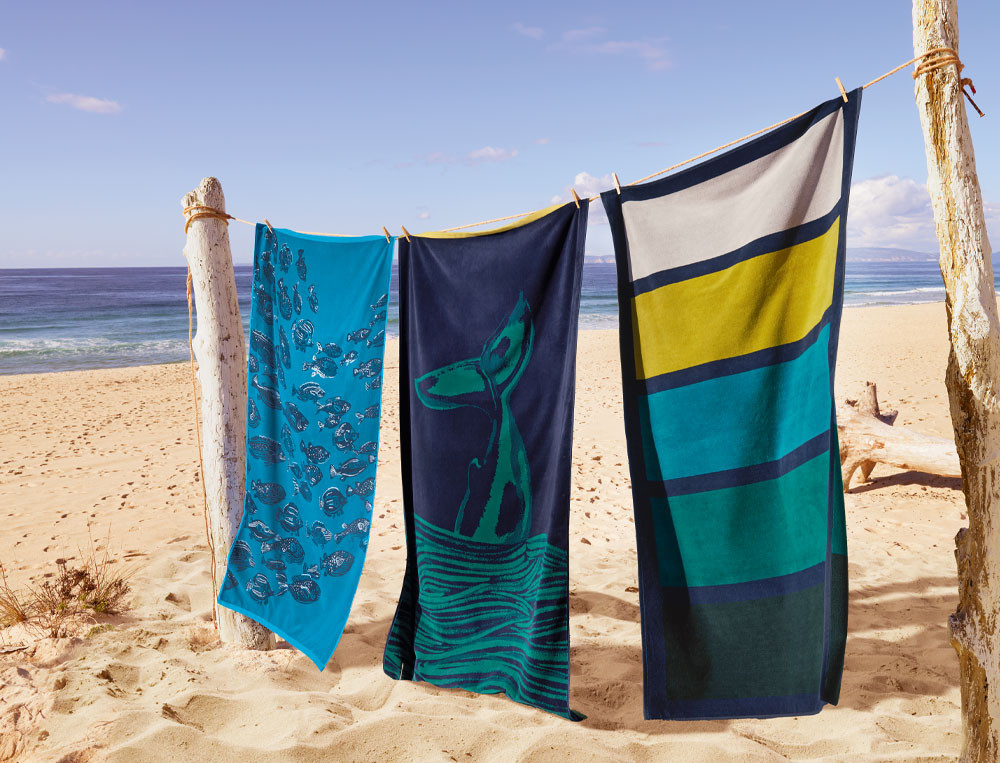 /fr/la-salle-de-bain/drap-de-bain/drap-de-plage-poissons-sous-les-vagues/