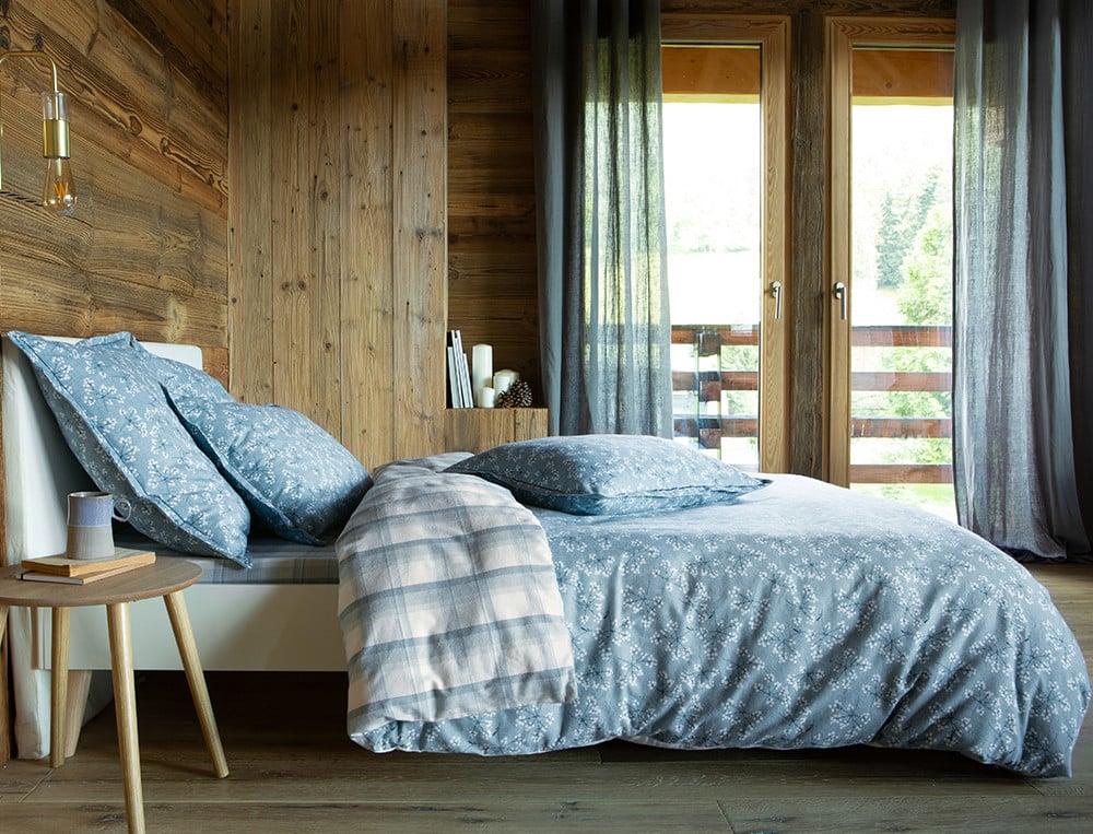 /fr/la-chambre/linge-de-lit/housse-de-couette/housse-de-couette-pause-enneigee/
