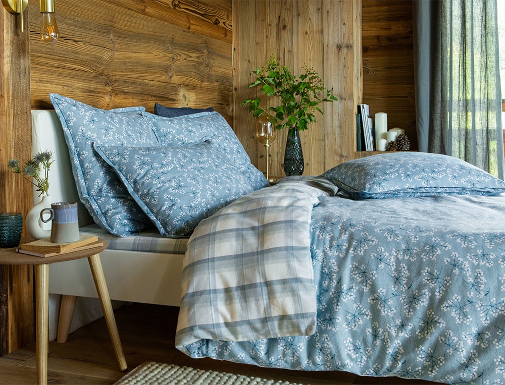 /fr/la-chambre/linge-de-lit/housse-de-couette/housse-de-couette-pause-enneigee/