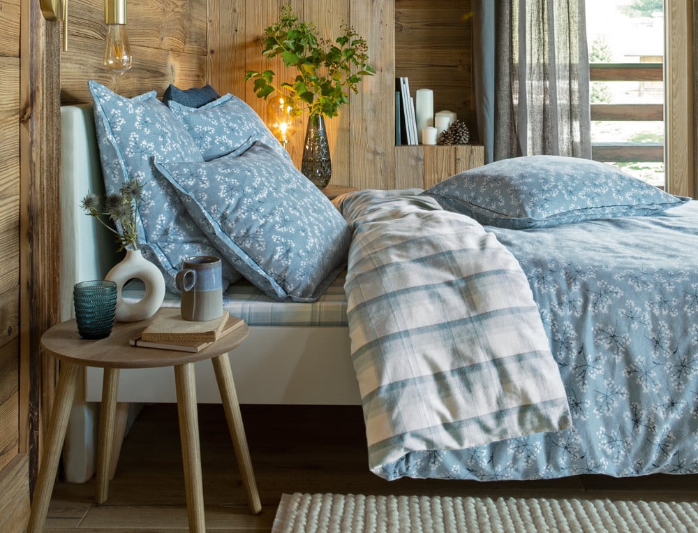 /fr/la-chambre/linge-de-lit/taie-d-oreiller/taie-d-oreiller-pause-enneigee/