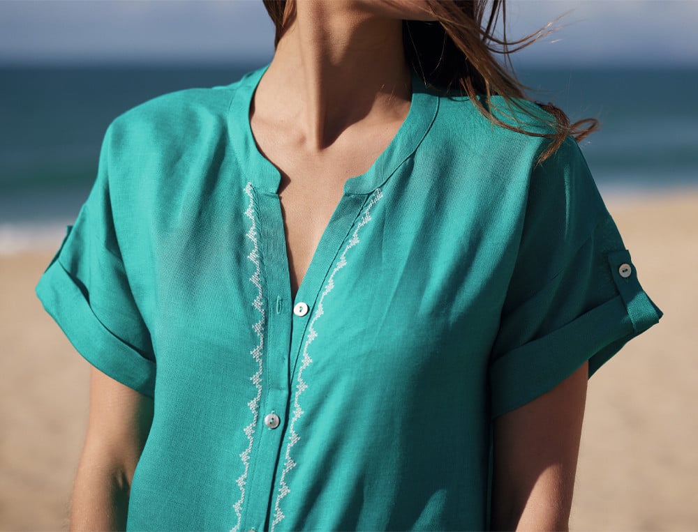 /fr/les-vetements-d-interieur/femme/robe-de-plage/liquette-turquoise-sur-le-lagon/