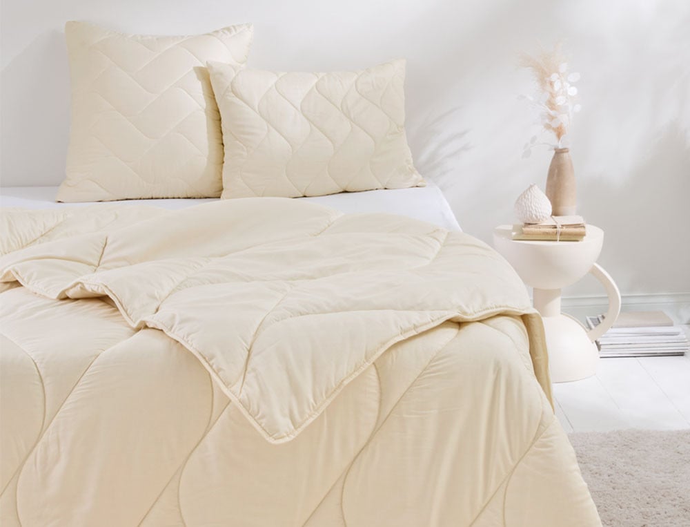 /fr/la-chambre/oreillers-et-traversins/oreillers-et-traversins-naturels/oreiller-confort-laine/