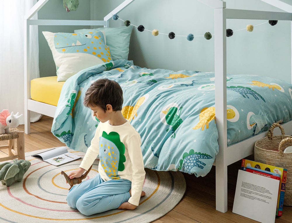 Drap-housse enfant uni jaune moutarde Dinos dans l'espace