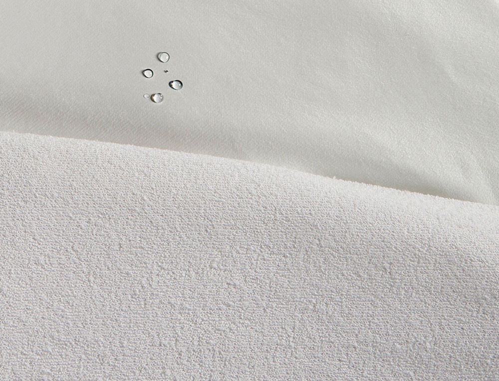 /fr/la-chambre/protections-et-cache-sommiers/protections-lits-impermeables/protege-matelas-eponge-elastomere/