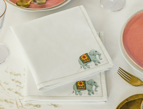 2 serviettes de table imprimées dans un angle Invitation au voyage