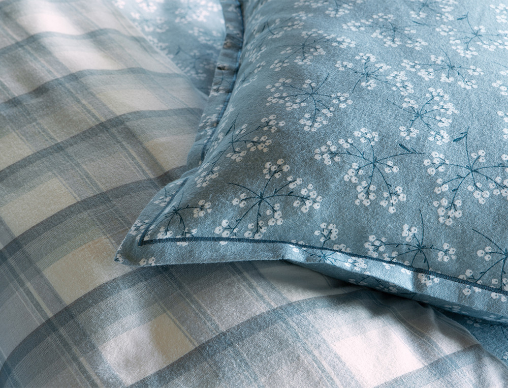 /fr/la-chambre/linge-de-lit/taie-d-oreiller/taie-d-oreiller-pause-enneigee/